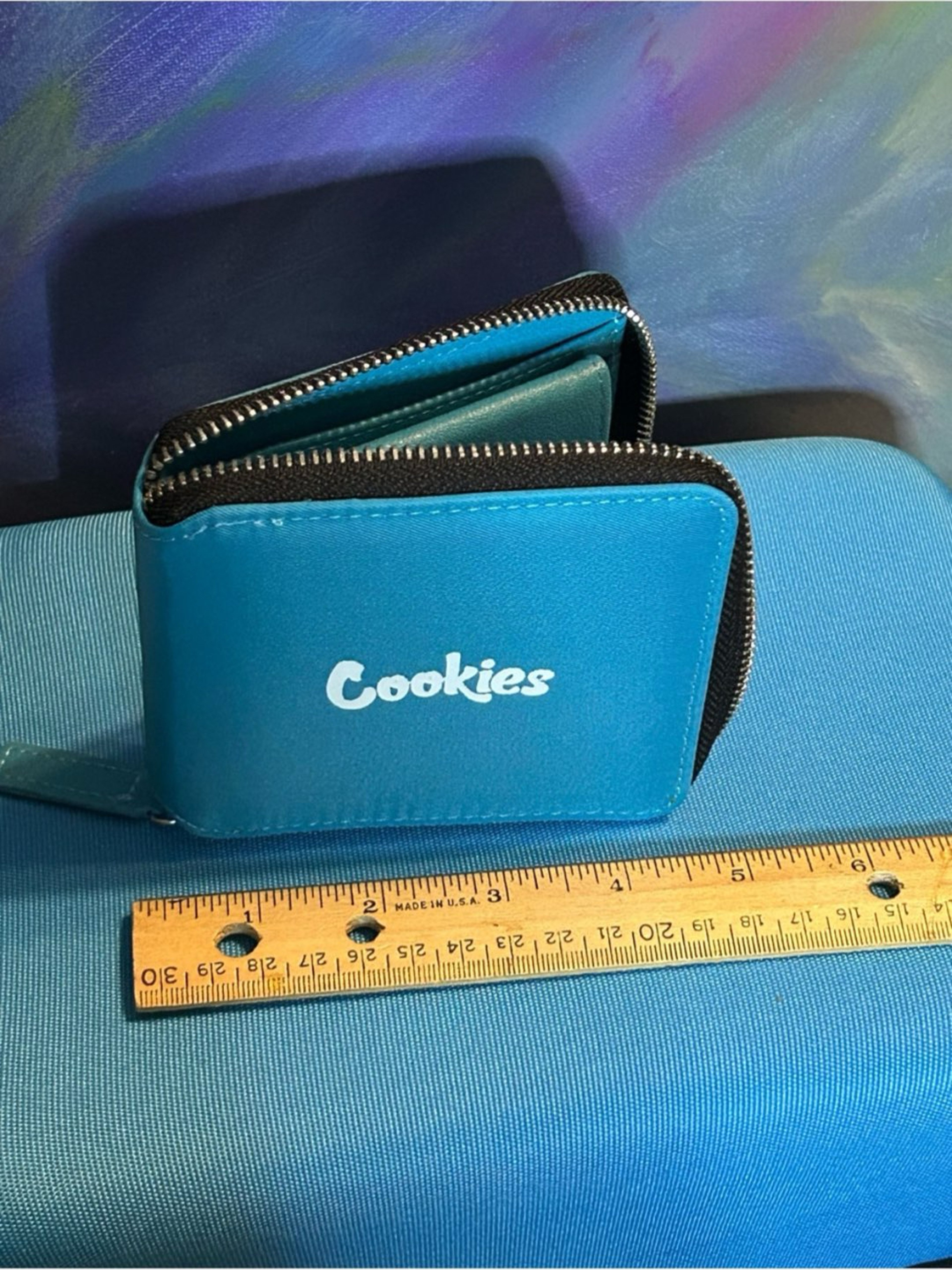 Preview pic of Sleek teal zip wallet by Cookies