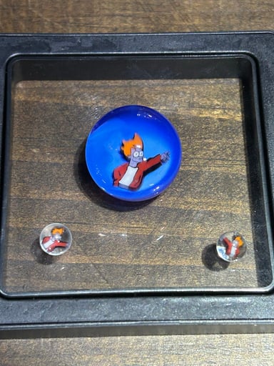 Preview pic of Futurama “fry” murrine marble and pearl set