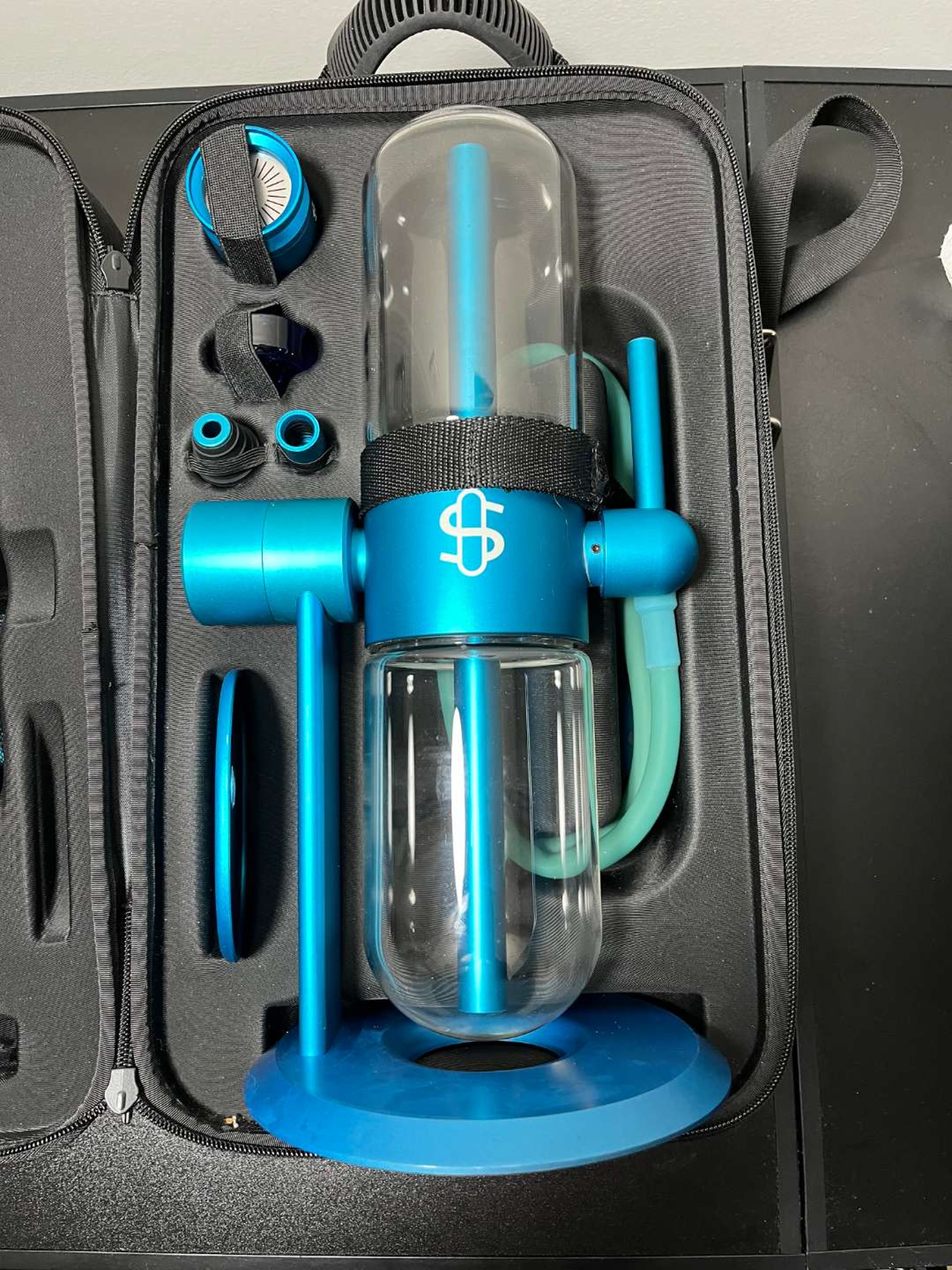 Preview pic of Studden Glass Cookies collab with case , light , extra clear glass and blue attachments