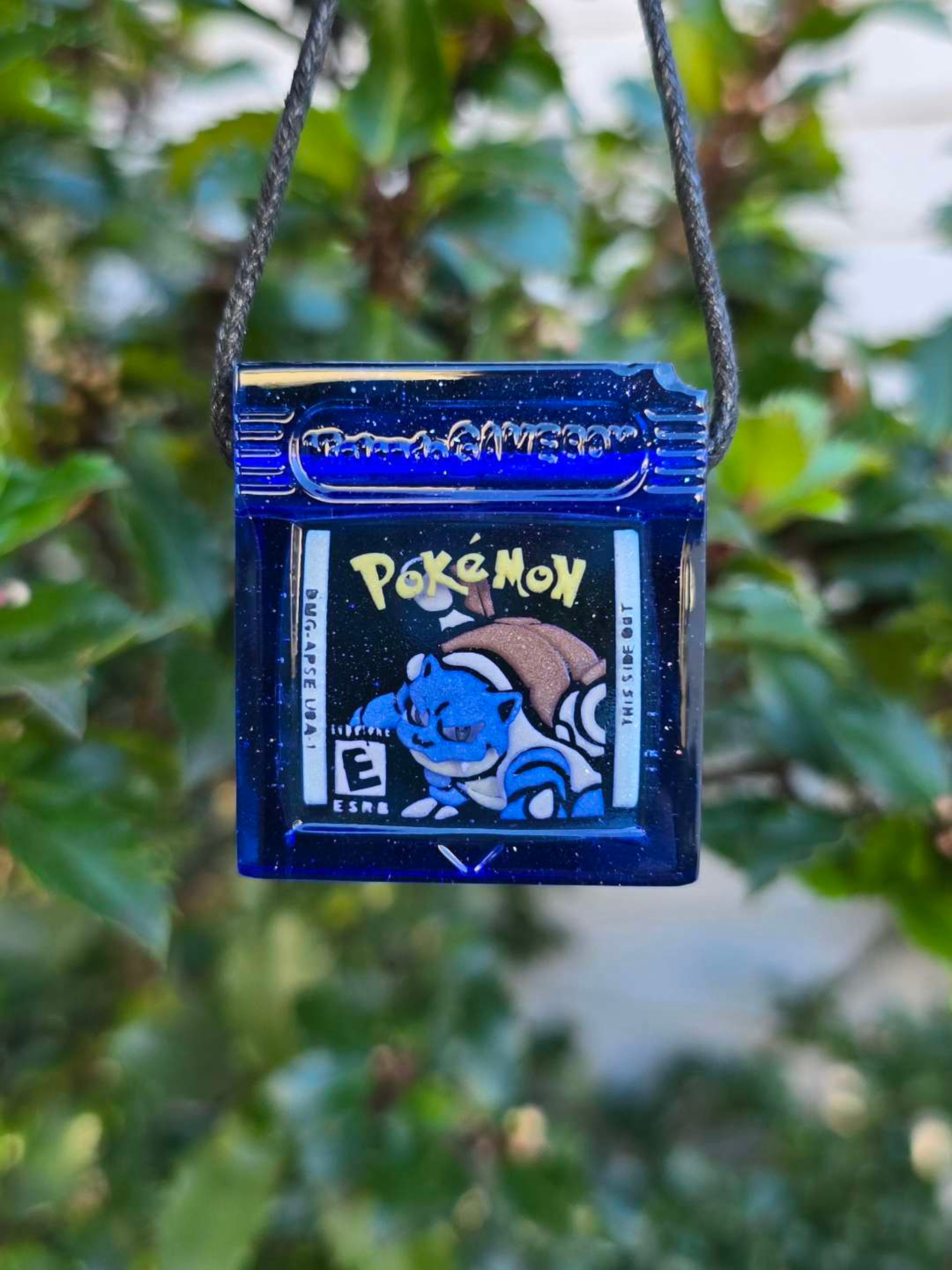 Preview pic of Pokemon Blue Glow in the Dark Game Cartridge Pendant