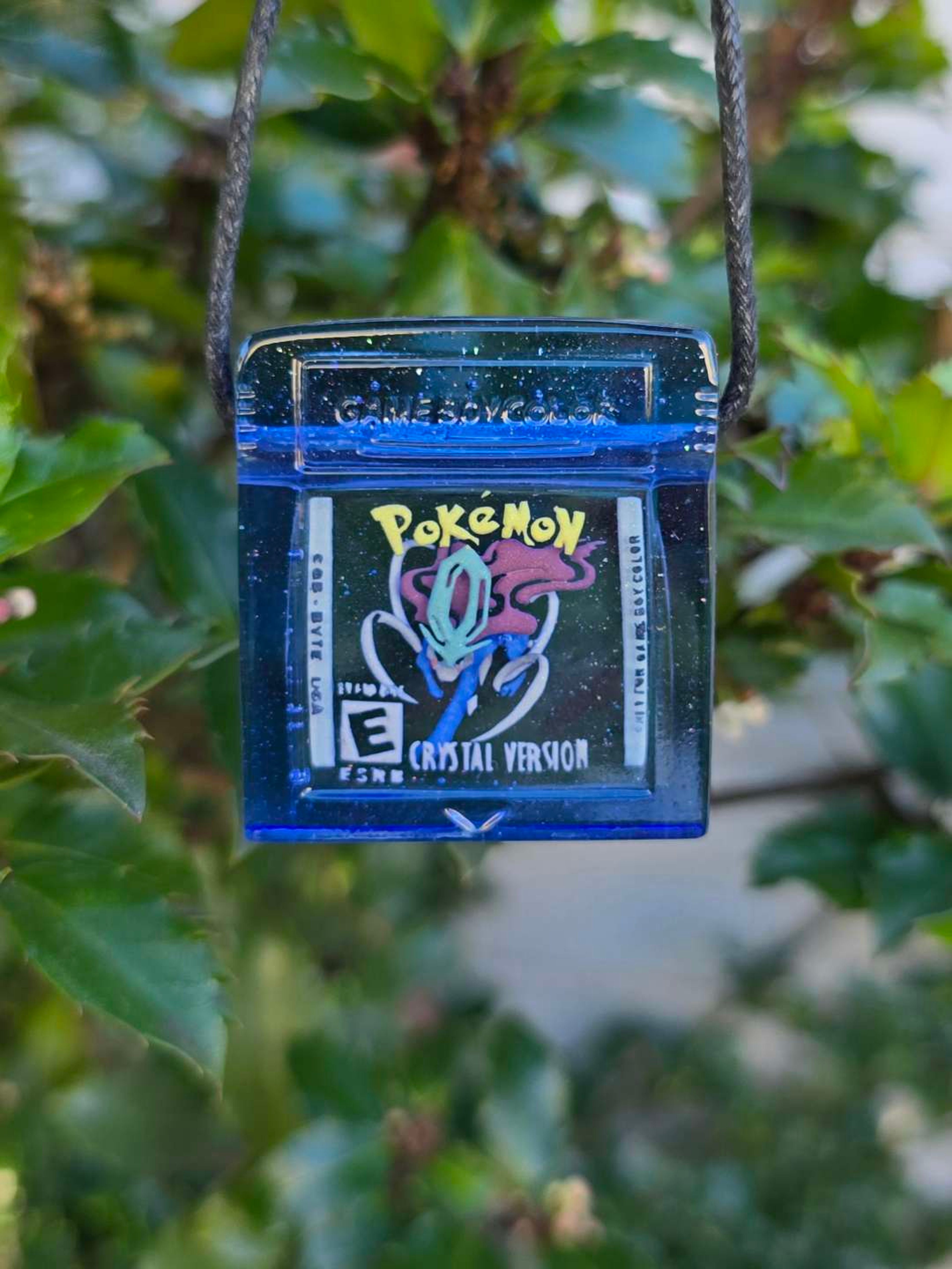 Preview pic of Pokemon Crystal Layered Glow Game Cartridge Pendant