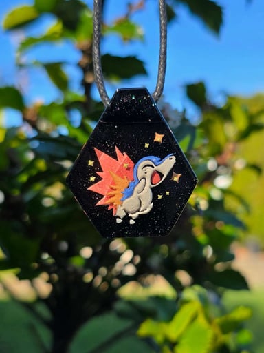 Preview pic of Cyndaquil Layered Glow UV Pendant