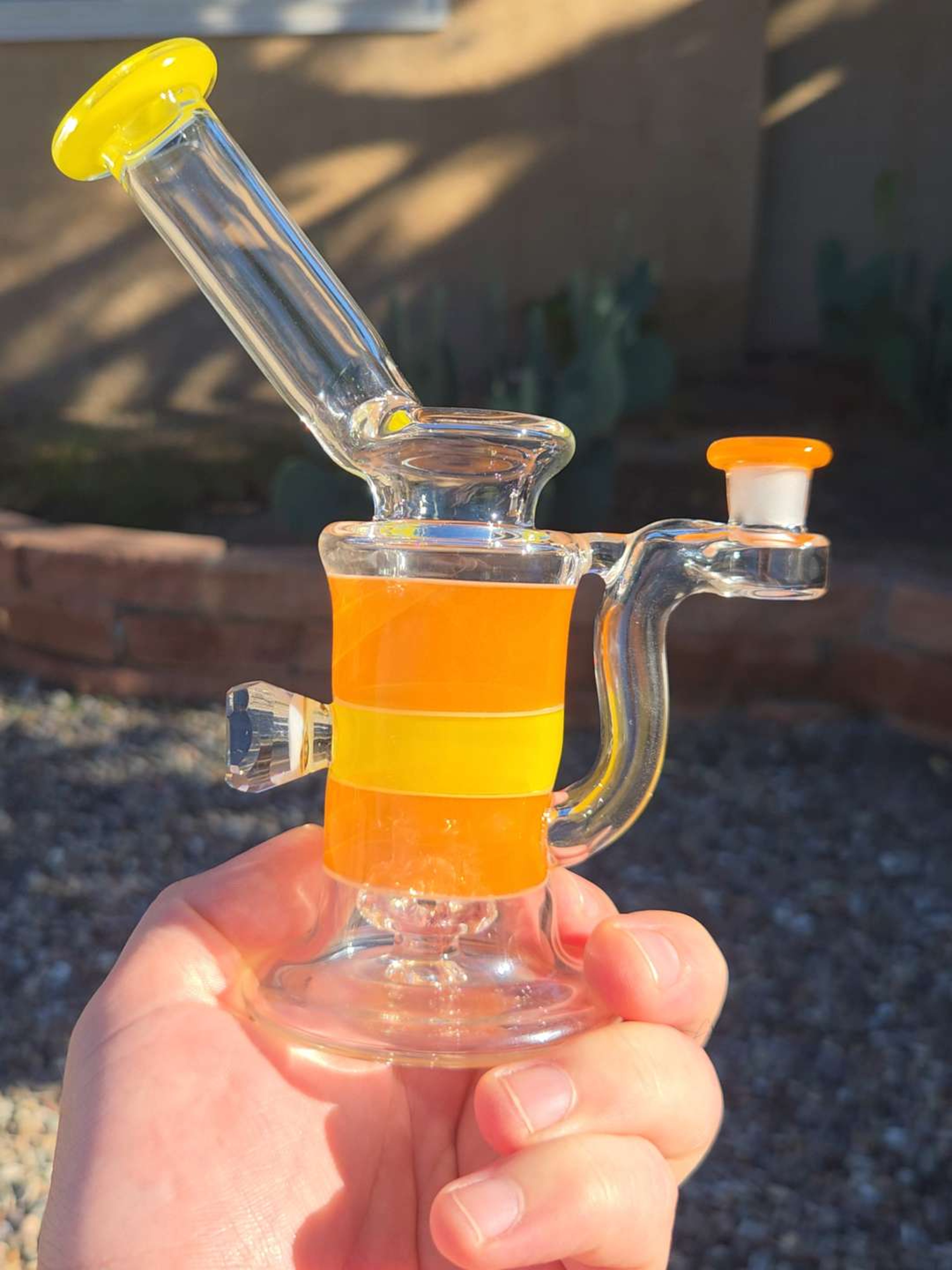 Preview pic of Orange and yellow rig with faceted milli attachment