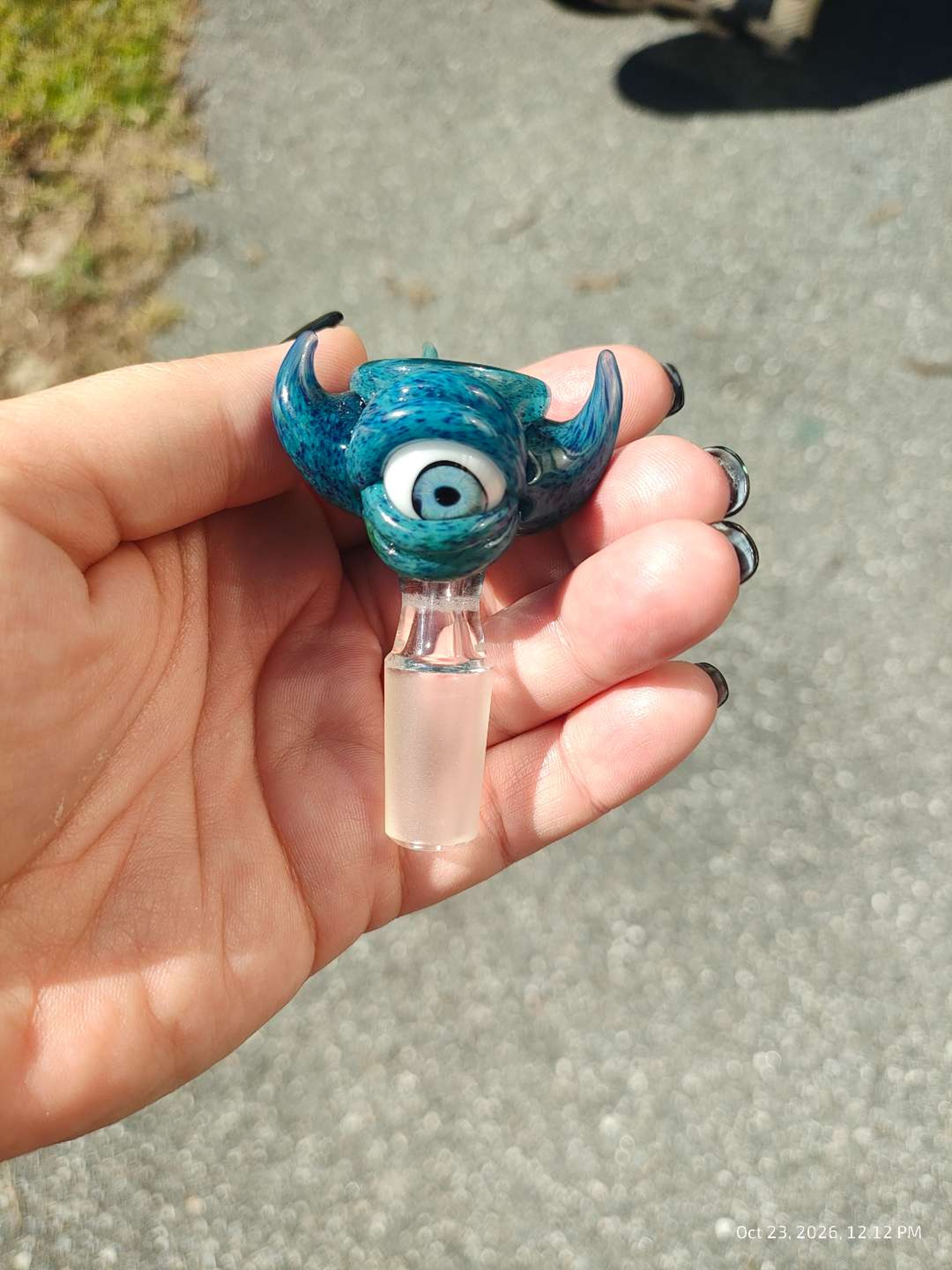 Preview pic of Blue Teal Cyclops Monster Glass Slide – Sculpted One-Eyed Creature with Curved Horns, Spikes & Mottled Blue Accents – 14mm Male Joint – Artist Unknown
