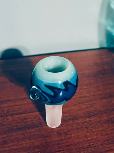 Preview pic of Colorful glass bowl featuring teal and blue waves design