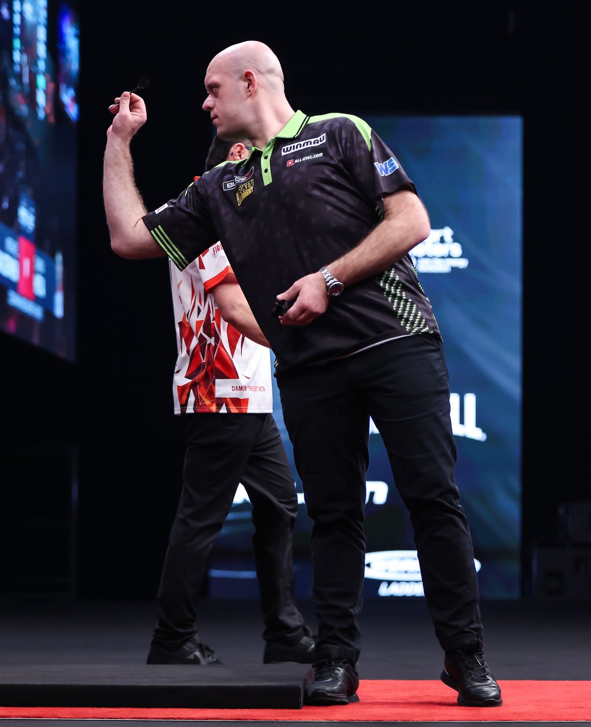 Michael van Gerwen demonstrating his stance at the oche during a PDC tournament
