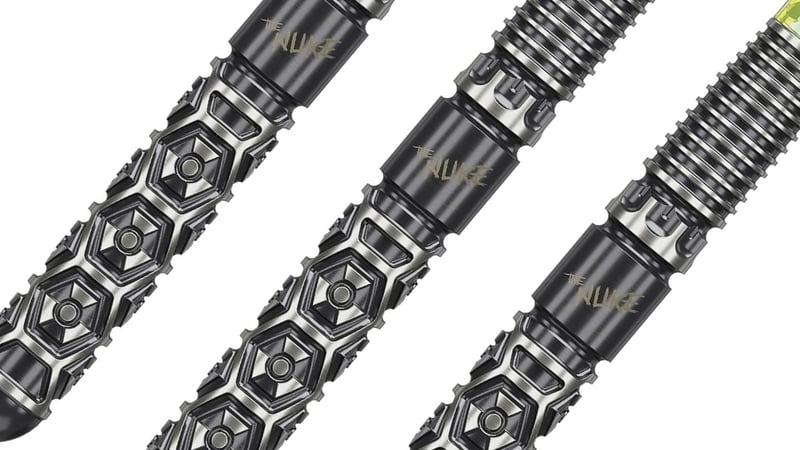 Target Luke Littler Fallout dart barrels at an angle showing the hexagonal grip pattern and black PVD finish