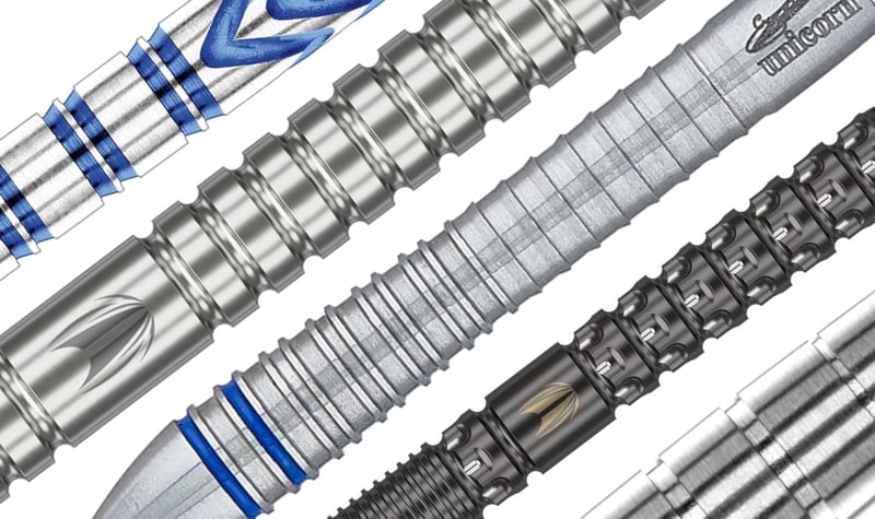 Top PDC professionals throwing darts on stage at a major tournament