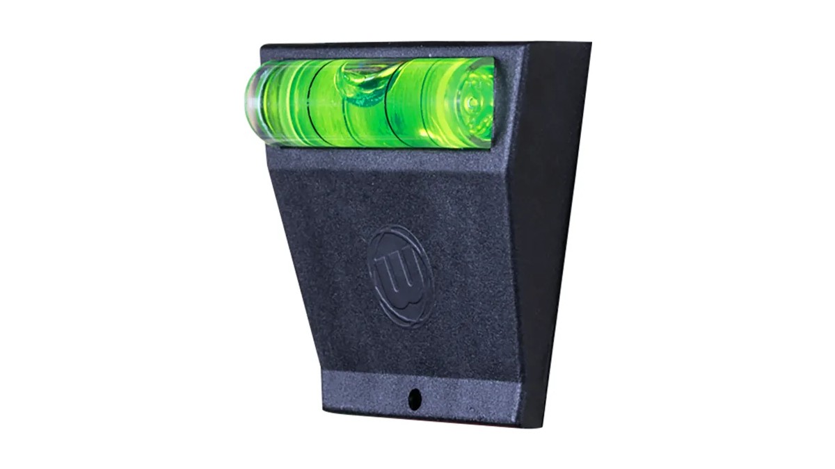 Winmau Spirit Master dartboard level in black with its green bubble vial along the top