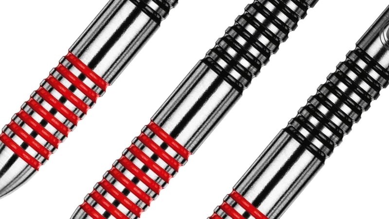 Winmau Ton Machine dart barrels at an angle showing the ring grip and red groove inlay