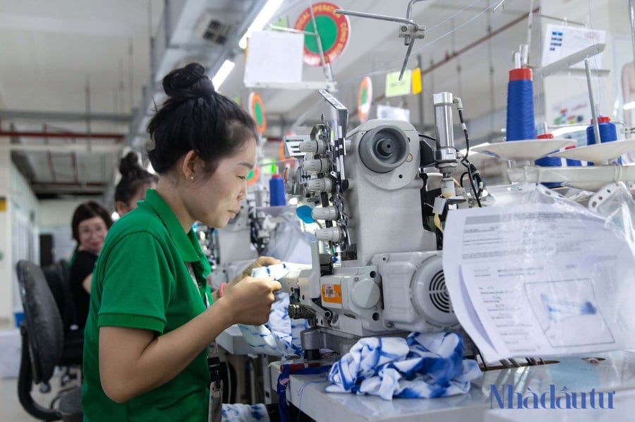 Vinatex, TNG tăng trưởng tích cực, doanh nghiệp dệt may vẫn đối mặt áp lực
