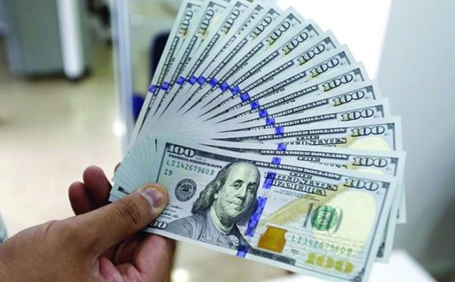 Dòng tiền đổ về đồng USD khi Phố Wall rung lắc mạnh