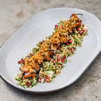 have you tried our chicken shish yet? 👀 our succulent chicken shish kebob features sunflower seed pomegranate crust + pistachio, and is served on a bed of freekeh salad 🙏 stop in this weekend to try ✨