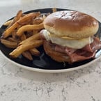 Meet your new favorite sandwich! 🤤 Thinly sliced mortadella, creamy provolone, and a perfect blend of dijon & mayo on a toasted brioche bun—served with crispy house-cut fries. Simple, classic, and packed with flavor! Who’s craving this? 🍽🔥 #PrimeCutsSteakhouse #MortadellaMagic #FoodieFavorites