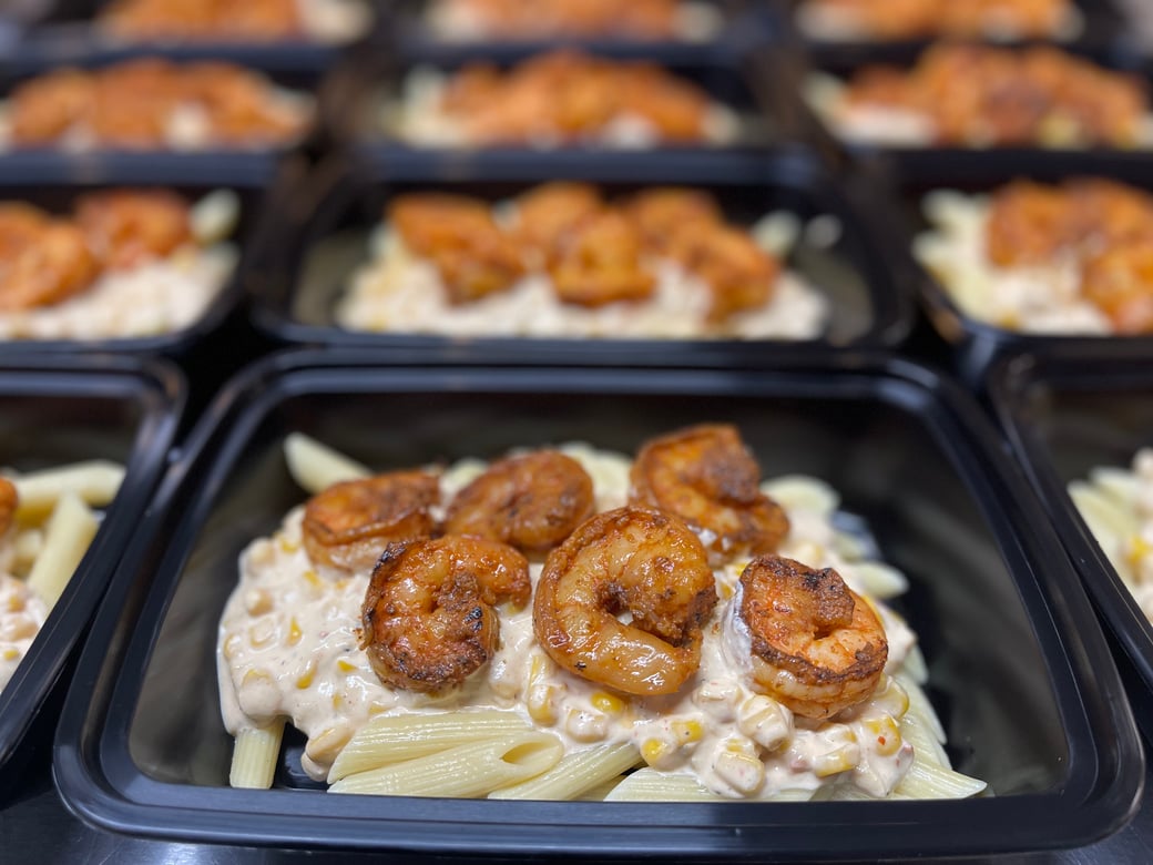 Blackened shrimp over GF penne w/ cajun corn chowder