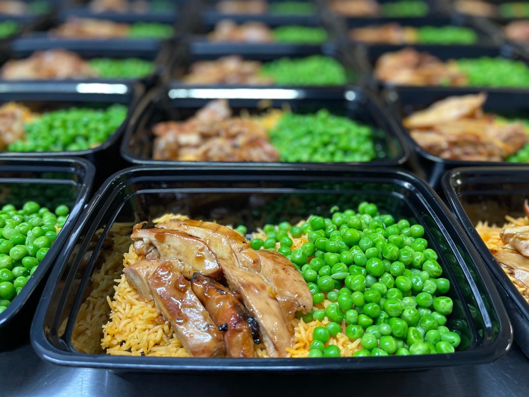 Chicken adobo thighs w/ red rice and peas