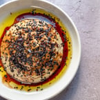 an elevated take on a classic spread //

our Babaganoush features:
- roasted eggplant pureed to perfection
- date molasses for sweetness
- black sesame seeds for a slight nutty flavour
- isot pepper lets a sweet heat

made fresh daily + served with a freshly-basked pita, we definitely recommend ordering next time ✨