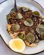 the start of something beautiful: whole roasted fish // chermoula + caper leaves + lemon - link in bio for full menu.