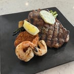 Crab Cake Specials. Appetizer special of 3 crab cakes, spicy aioli, and lemon caper aioli for $12. Surf n' Turf with the 10oz Prime Graded Ribeye, Tuscan rosemary potatoes, grilled asparagus, 2 grilled shrimp and a crab cake, topped with herby compound butter for $40. This Friday and Saturday from 3pm-9pm.