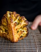 azhar offers multiple vegetarian-friendly dishes 〰️ OVEN ROASTED CAULIFLOWER features hawaij + almond cream + pistachios + almonds + herbs + chive oil