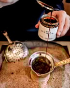 date molasses coming in hot 😰  this sweet syrup can be used as a topping, or great sweetener in baking or cooking. we like to use it in our coffee. available for purchase at our marketplace for $6