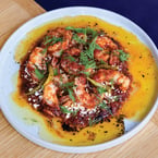 A feast for the senses 🦐

This seasonal seafood dish features a spiced tomato sauce, creamy feta, ouzo - a dry, anise-flavoured aperitif - and fresh dill. Served with a side of schug for dipping. 

See you in a bit, open 5:30-10 tonight ✨

#ShrimpSaganaki #NewMenuAlert #SeafoodLoversUnite #MiddleEasternInspired 
#ossingtoneats