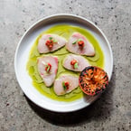 crudo 💫 jalapeno + yuzu kosho + kalamansi + ajika + chive oil + charred clementine