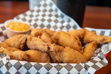 Hand Breaded Frog Legs