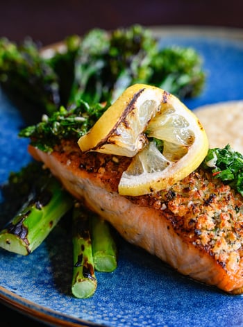 The Parmesan Crusted Salmon at BellaBrava Bexley is built around contrast — the crust, the lemon caper gremolata cutting through it, the creamy Asiago polenta underneath pulling everything back into balance. Grilled broccolini and a charred lemon finish it in a way that feels considered rather than composed. It is one of the most complete plates on the menu and one of the easiest to order twice. 

📸 Parmesan Crusted Salmon

#bellabrava #bexley #salmon #italianfood #landolakes