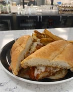 Golden, crispy chicken parm stacked high with melty mozzarella and rich marinara — a handheld Italian masterpiece at Prime Cuts Italian Steakhouse.

#thebear #TravelTips #summerfood #TravelTips #summerfood