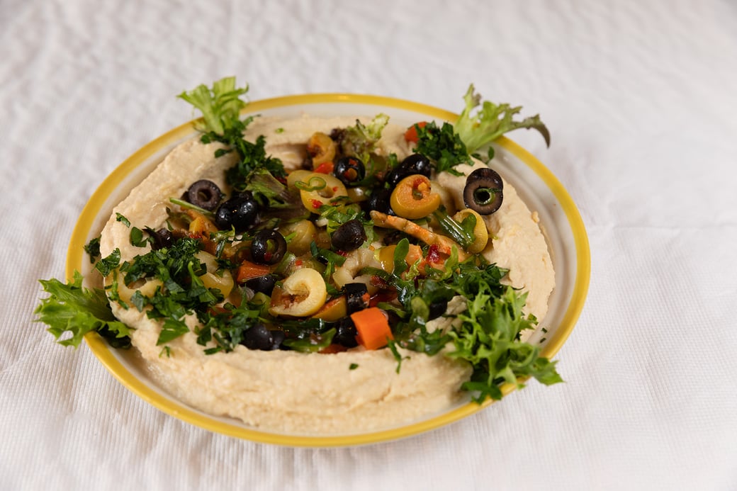 Vegetable and Olive topped Hummus