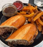 Dipped, cheesy, and packed with flavor! 🤤 This Italian beef from Prime Cuts Italian Steakhouse in Sault Ste. Marie, MI is everything you want in a sandwich—tender beef, melty cheese, and a side of that rich au jus. Plus, those crispy fries? Perfection! Who’s craving one? 🍽🔥 #ItalianBeef #primecutsitaliansteakhouse  #SooMichiganEats #FoodieFinds