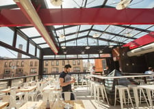 Retractable roof helps this restaurant push the boundaries of patio season