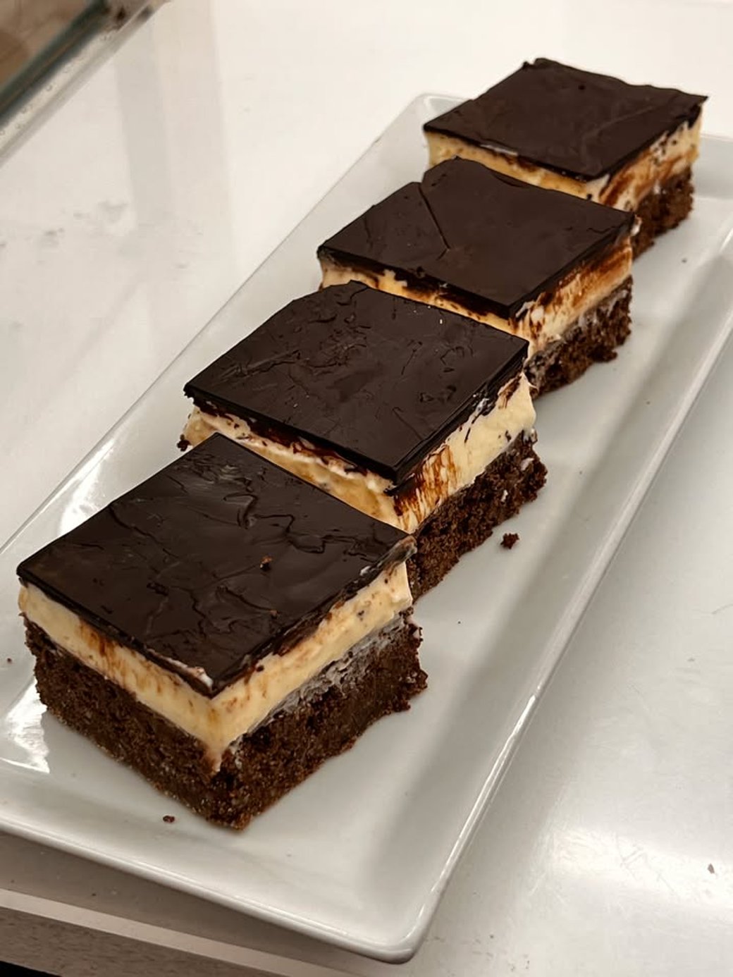 Keto Lemon Brownie Cheesecake Bars