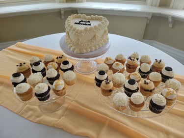 wedding cake and cupcakes