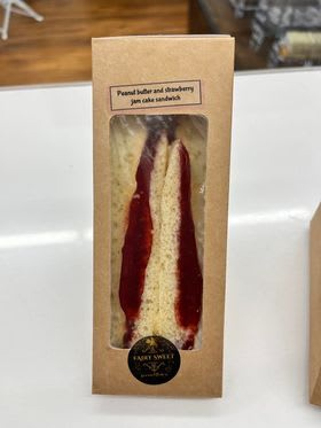 peanut butter and raspberry jam cake sandwich