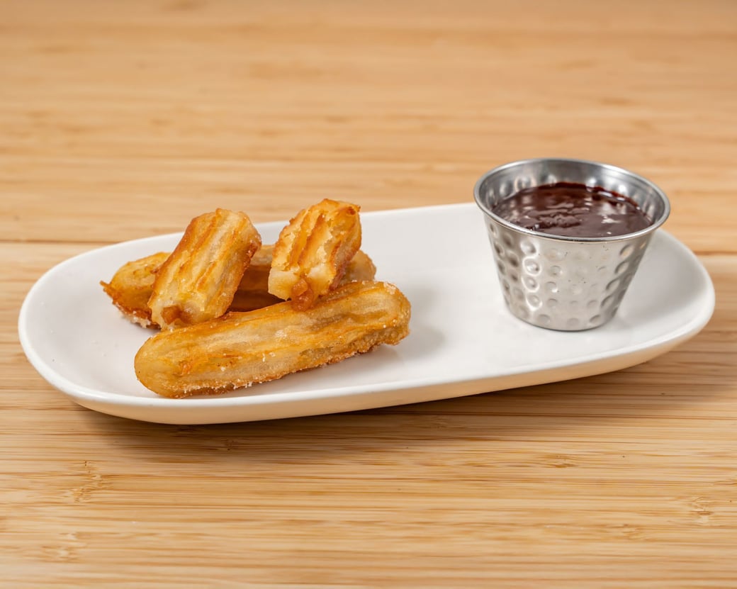 CARAMEL FILLED CHURROS WITH WARM CHOCOLATE