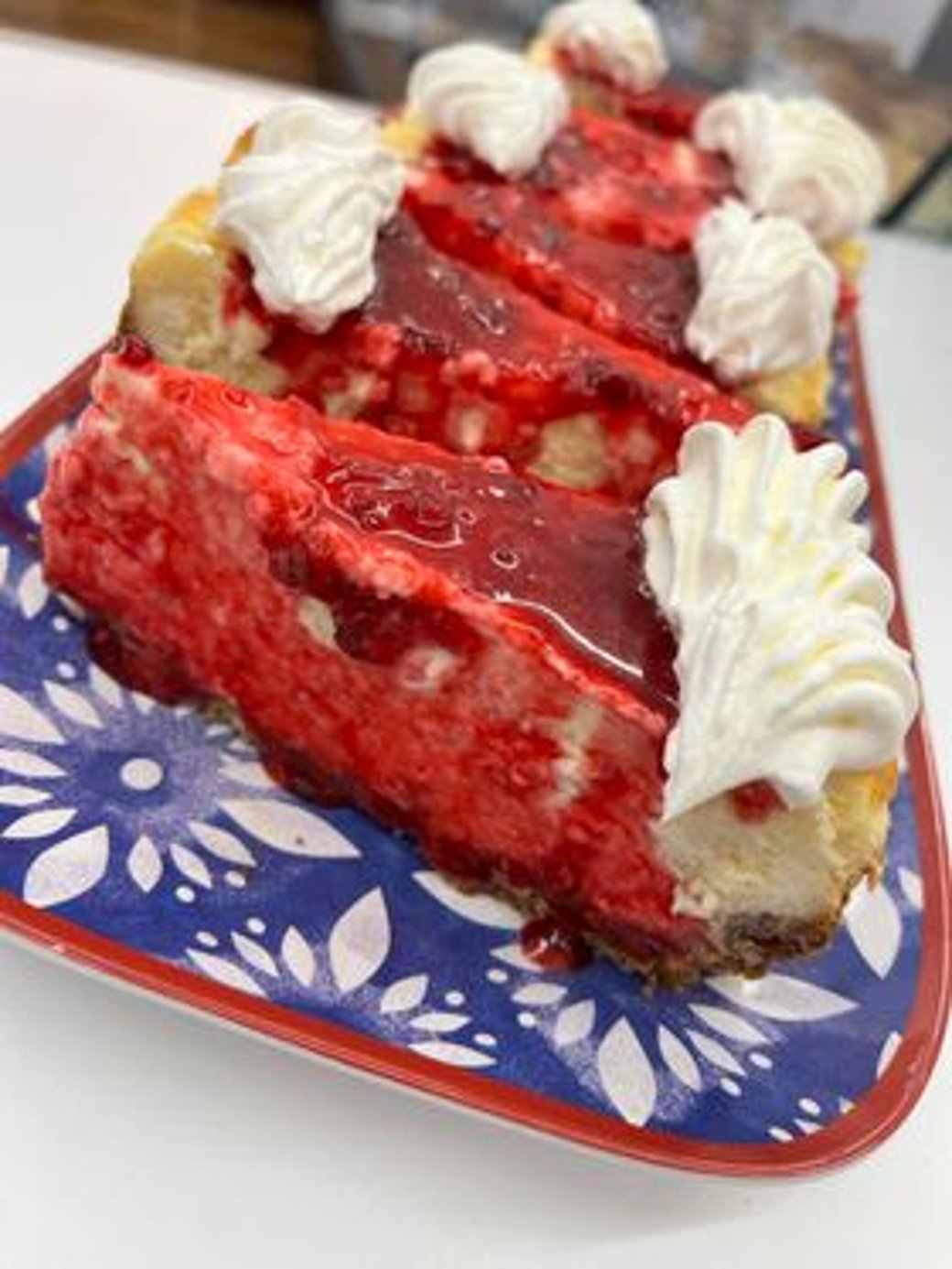 Raspberry coulis pretzel crust cheesecake 