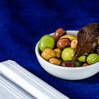 marinated olives // fennel seed + isot dukkah + citrus oil - available on our marketplace + or through ubereats! p.s. we're back open for pickup & delivery tomorrow. tag a pal and let them know!