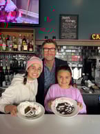 Gary posing with Leïla and Charlotte after they made their special custom desserts! 