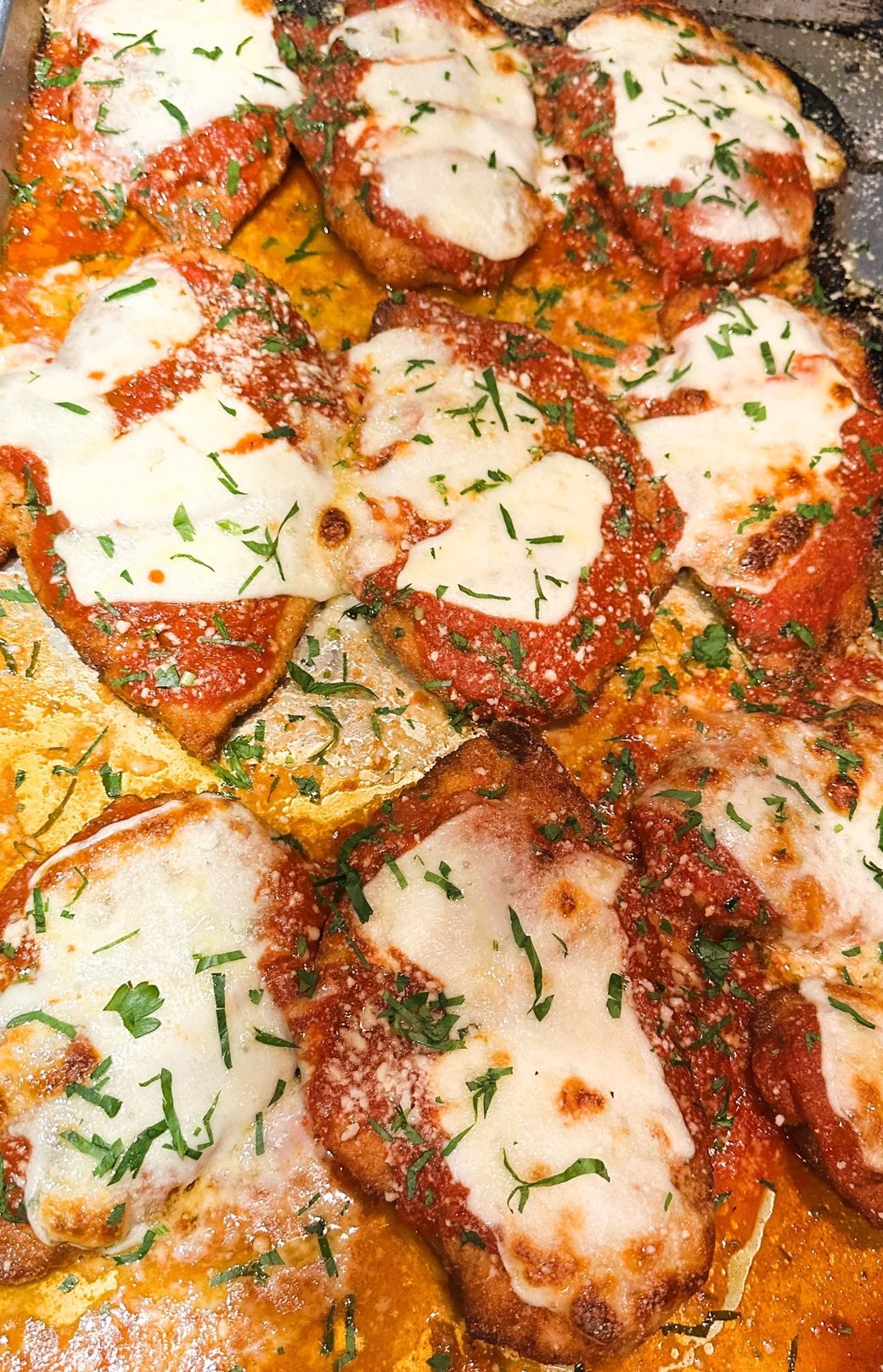 <p><strong>CHICKEN PARMIGIANA</strong></p>