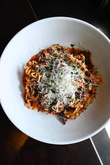 Slow-braised short rib ragu is a commitment, the kind that starts well before service and arrives at the table as something you can taste the time in. At BellaBrava Bexley, it lands on housemade mafaldine pasta, the ruffled ribbons doing exactly what they were shaped to do, finished with Grana Padano and Italian parsley. No flourish. No theatrics. Just a bowl of pasta that makes everything else in the room recede for a moment.

📸 Short Rib Ragu

#bellabrava #bexley #shortribragu #housemadepasta #italianfood #landolakes