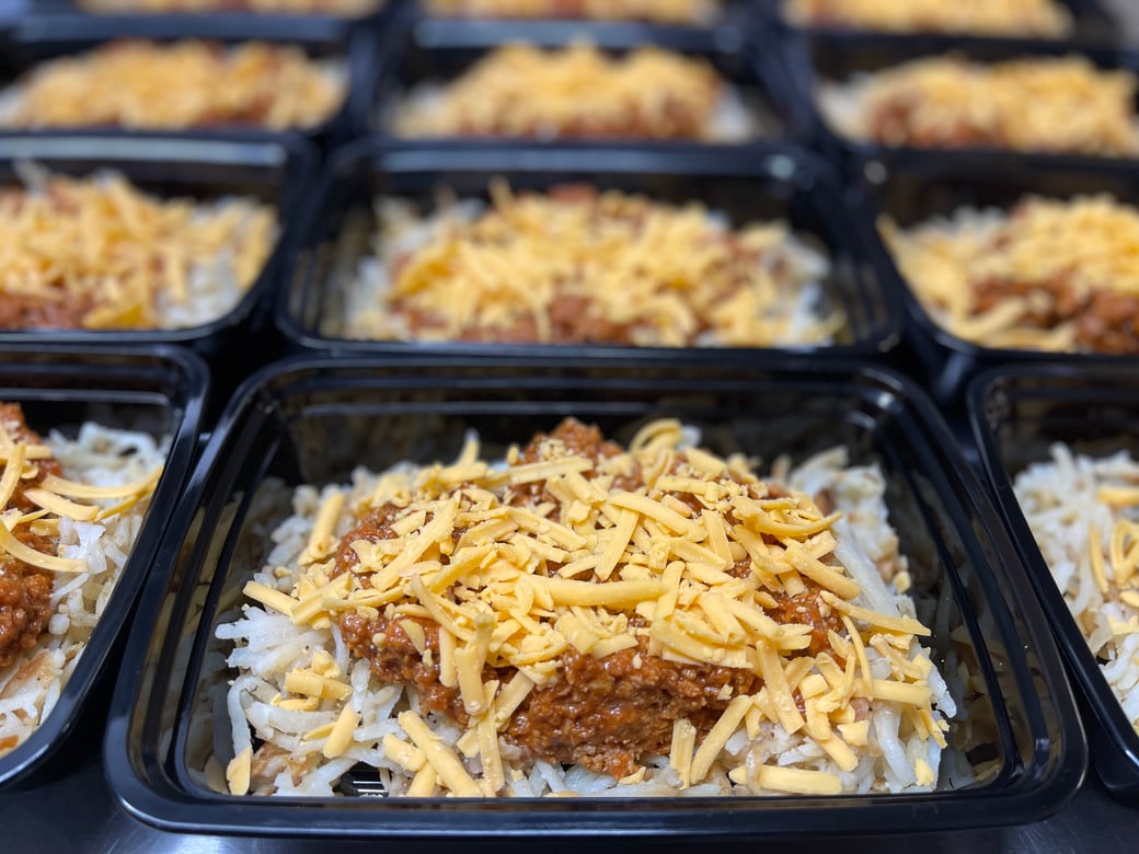 Sloppy Joe over hash browns w/ onions