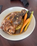 Tender, rich, and full of flavor — our braised pork shank osso buco is served with creamy polenta and roasted rainbow carrots. It’s everything your weekend dinner should be.
Stop in and order before it’s all gone! 

#primecutsitaliansteakhouse #SweetTooth #ItalianFlavors #HomemadeGoodness #DineInStyle #TreatYourself #FoodLovers #ChefSpecial