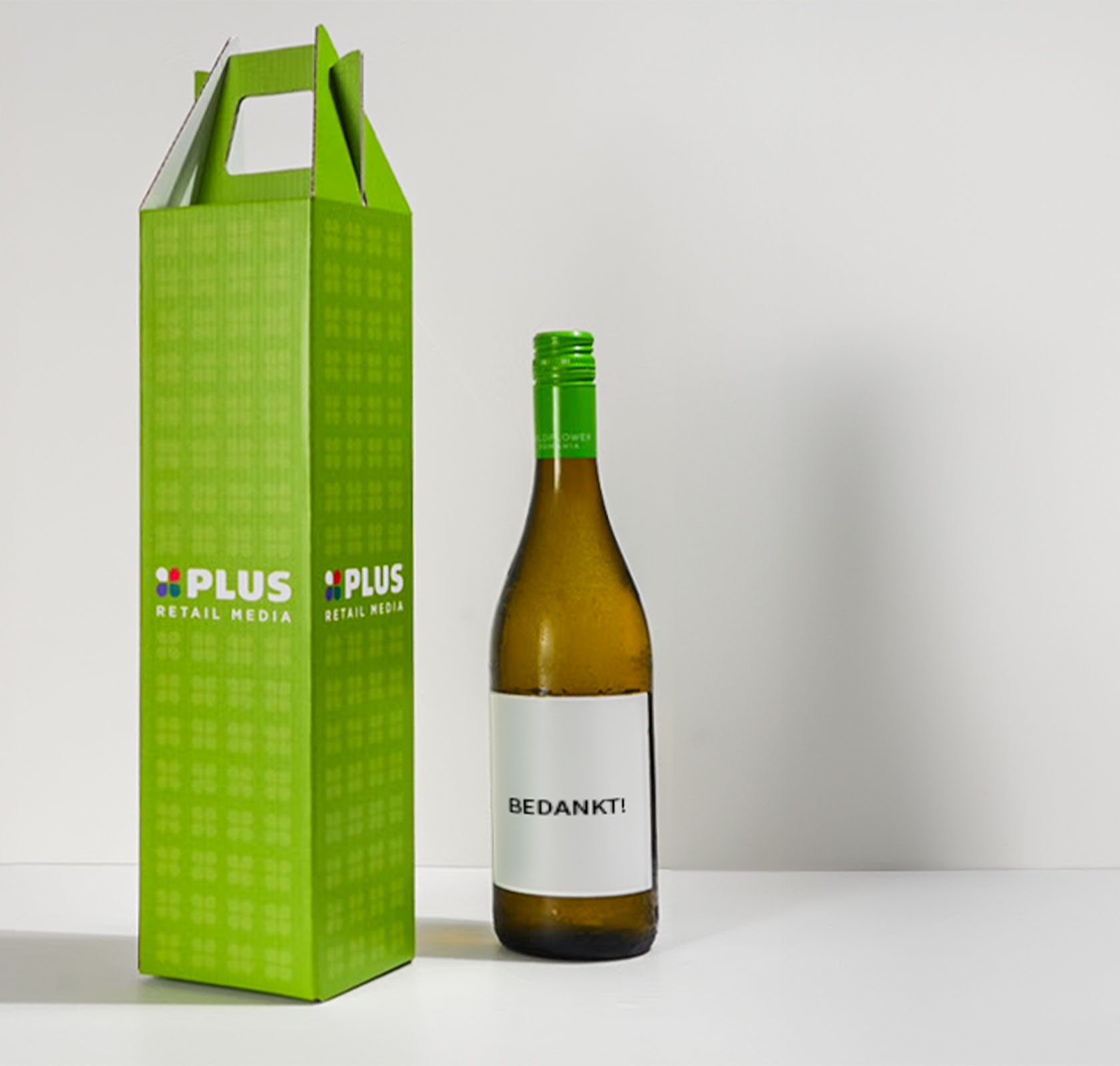 Wijnfles met bedrukt wijnlabel en wijnverpakking bedrukt als zakelijk relatiegeschenk