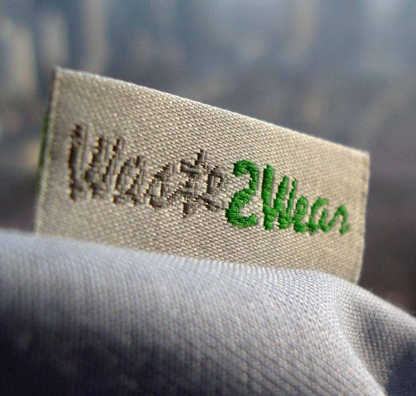 Productieproces van Waste2Wear met gerecycled plastic textiel