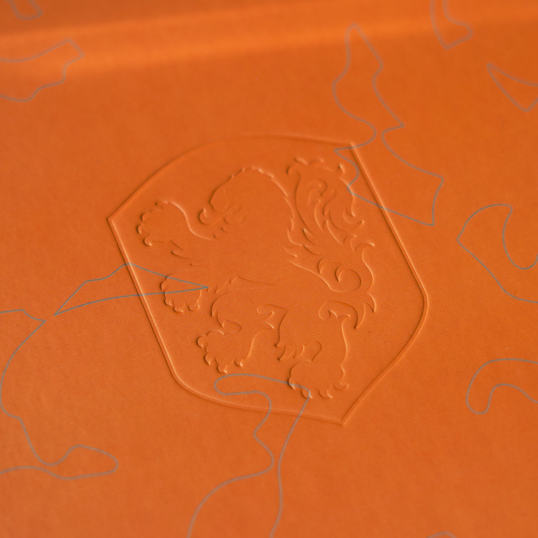 Detail in kaft van oranje boek