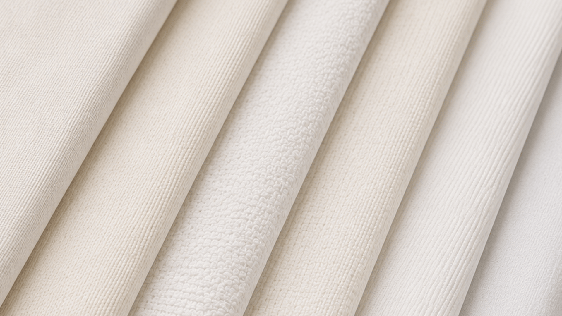 Verschillende soorten textiel materiaalsoorten naast elkaar