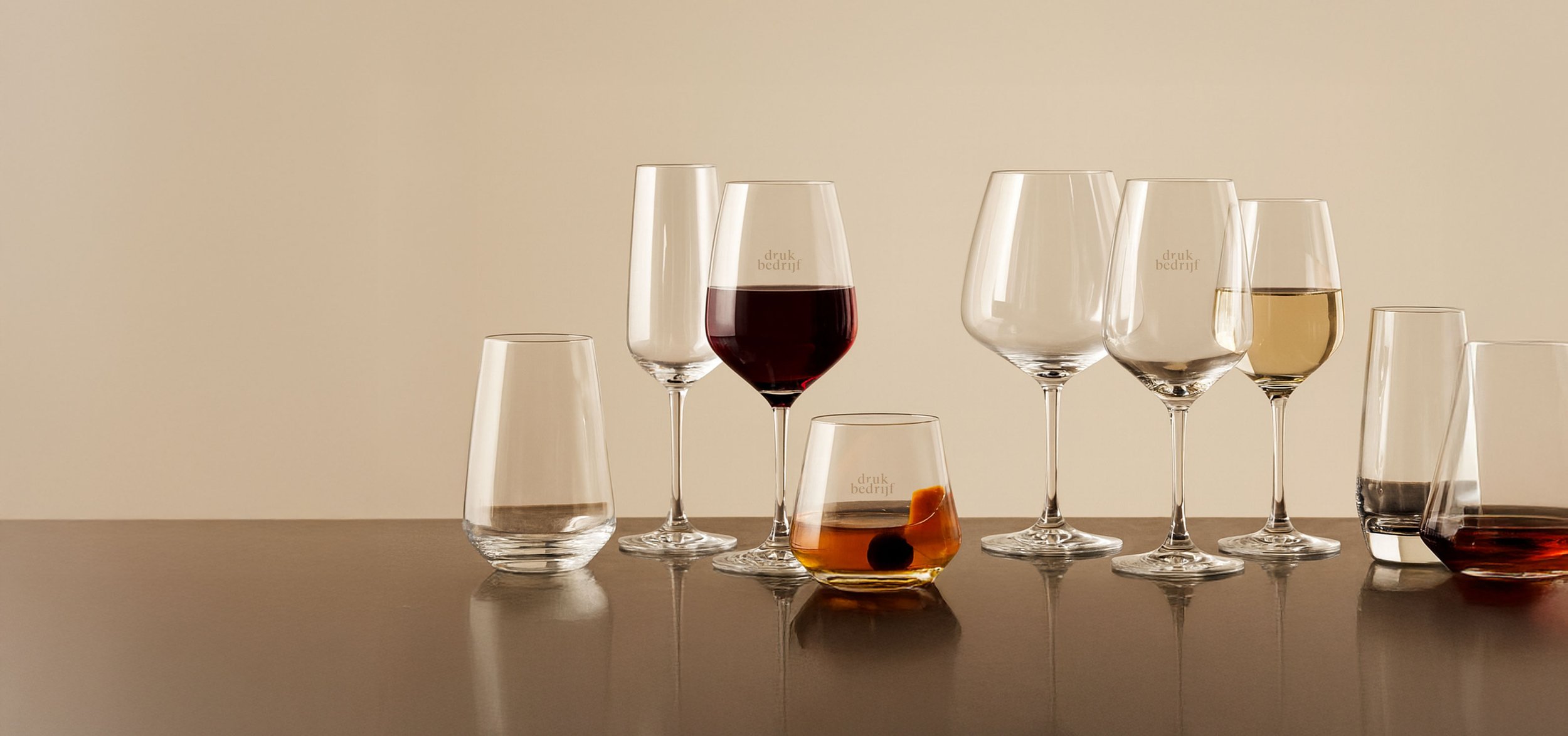 Diverse glazen graveren met eigen logo