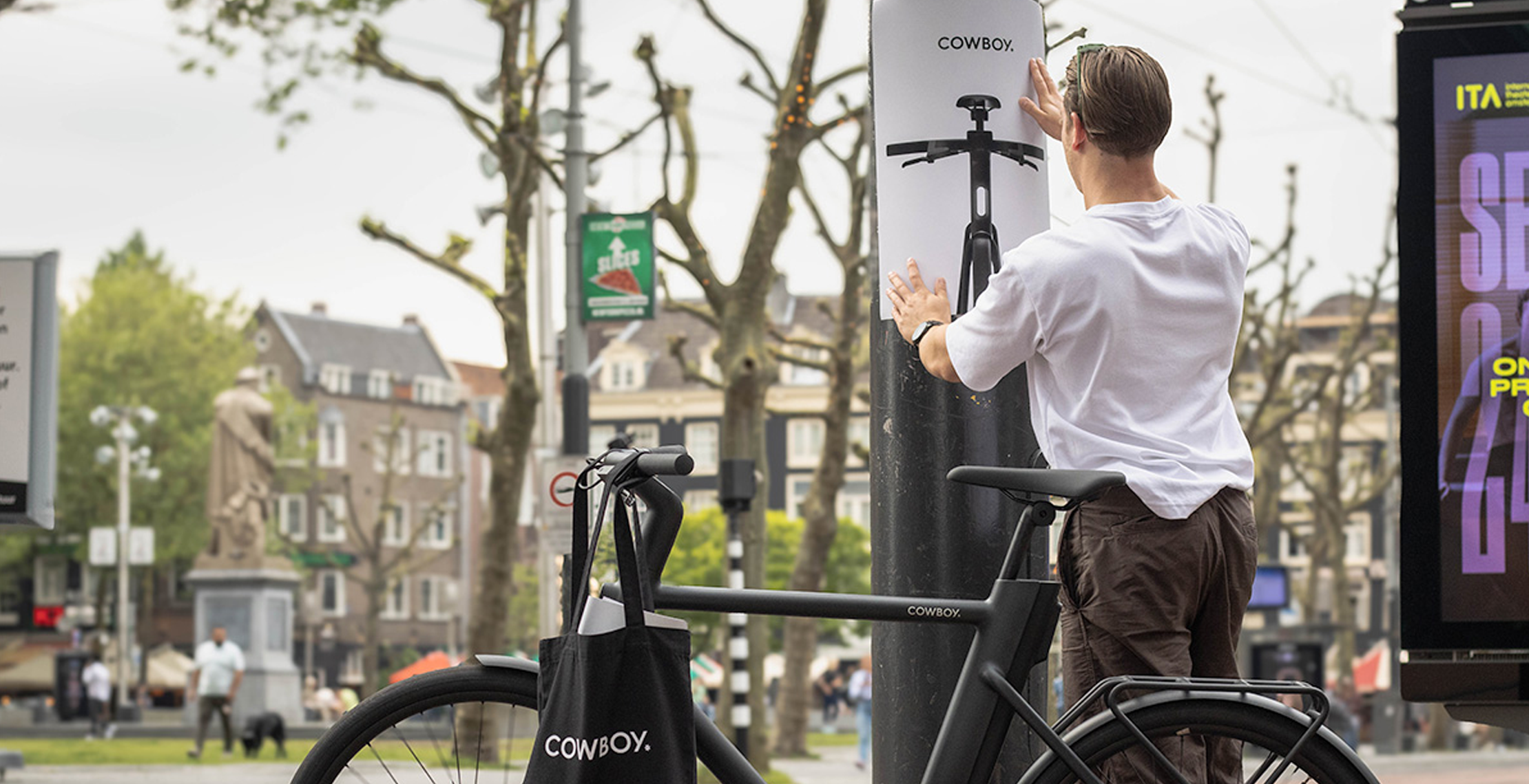 Poster bedrukt voor Cowboy en op paal in Amsterdam opgehangen.